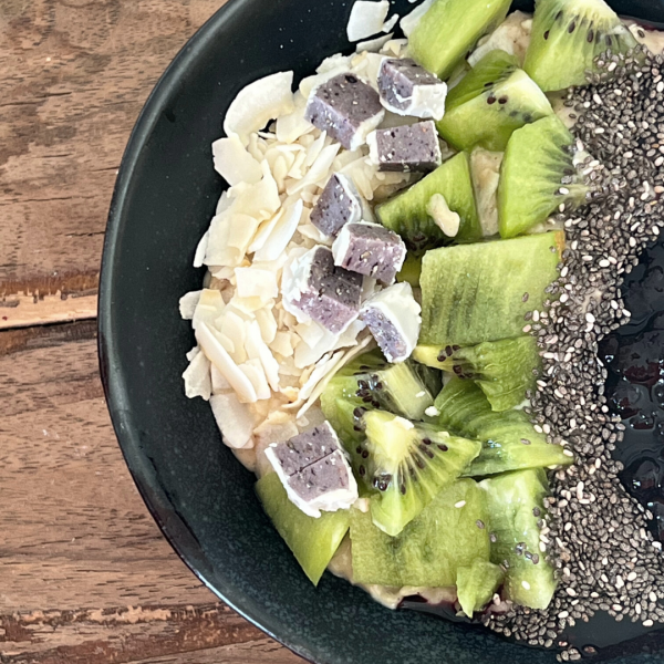 Overnight oats with chia, kiwi, coconut, and protein bar